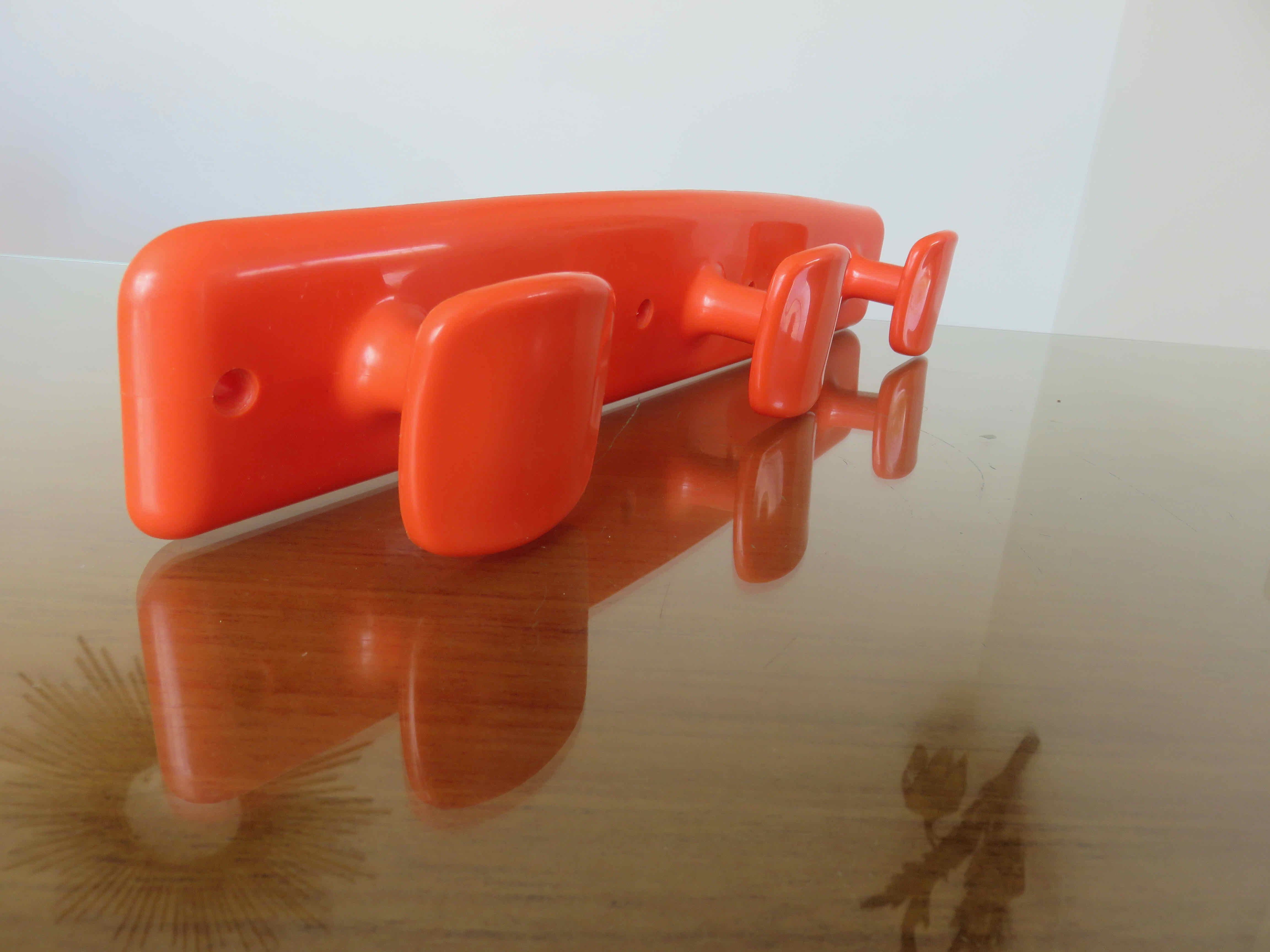 Orange plastic wall coat rack "syla" france 1970