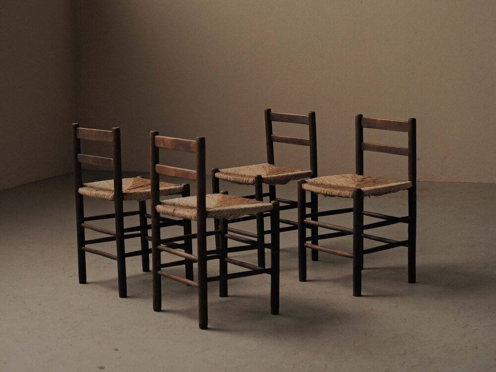 Set of four wooden and straw chairs, around 1960.