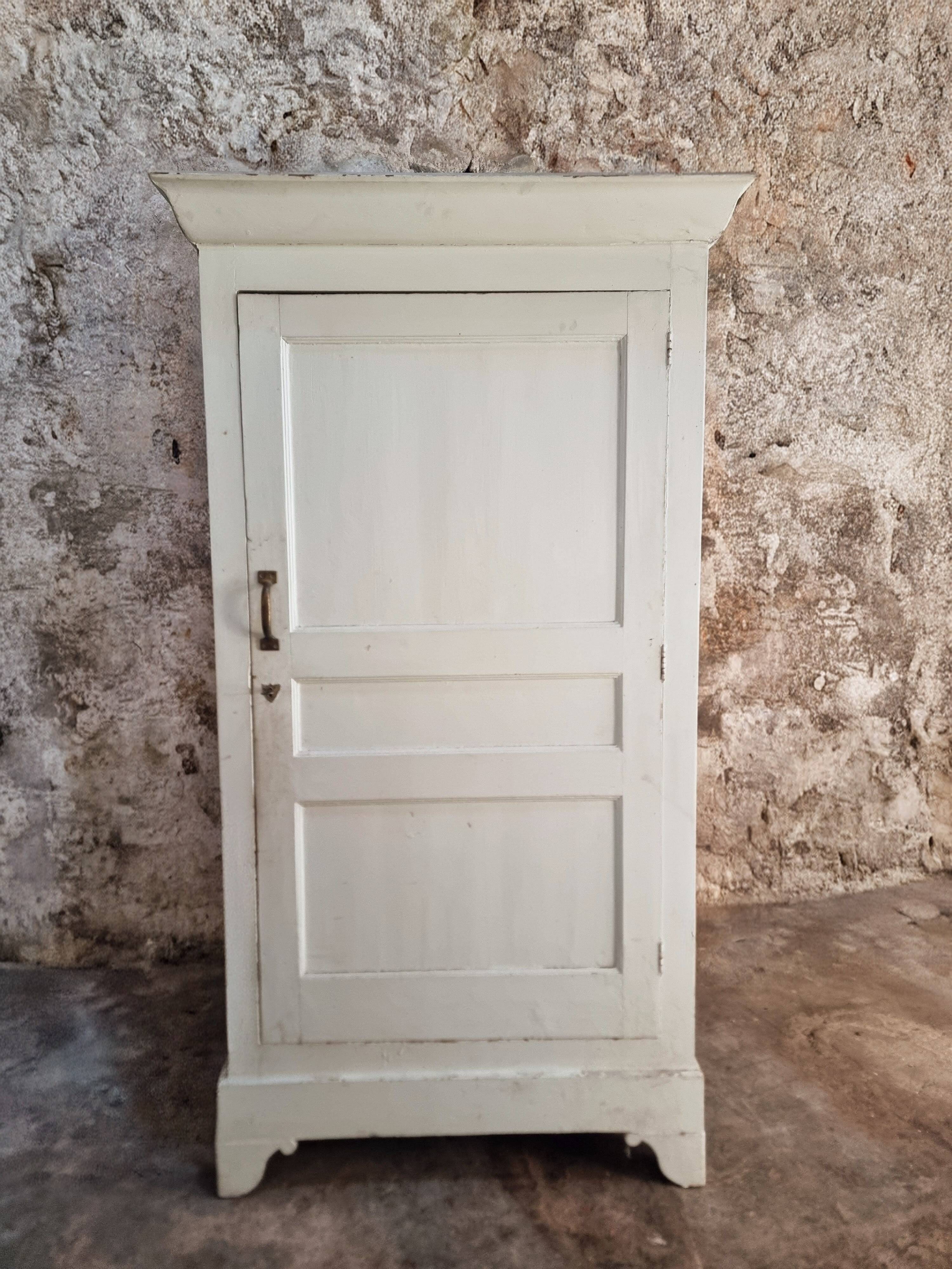 Antique French pine wardrobe with original white paint, circa 1900–1920.