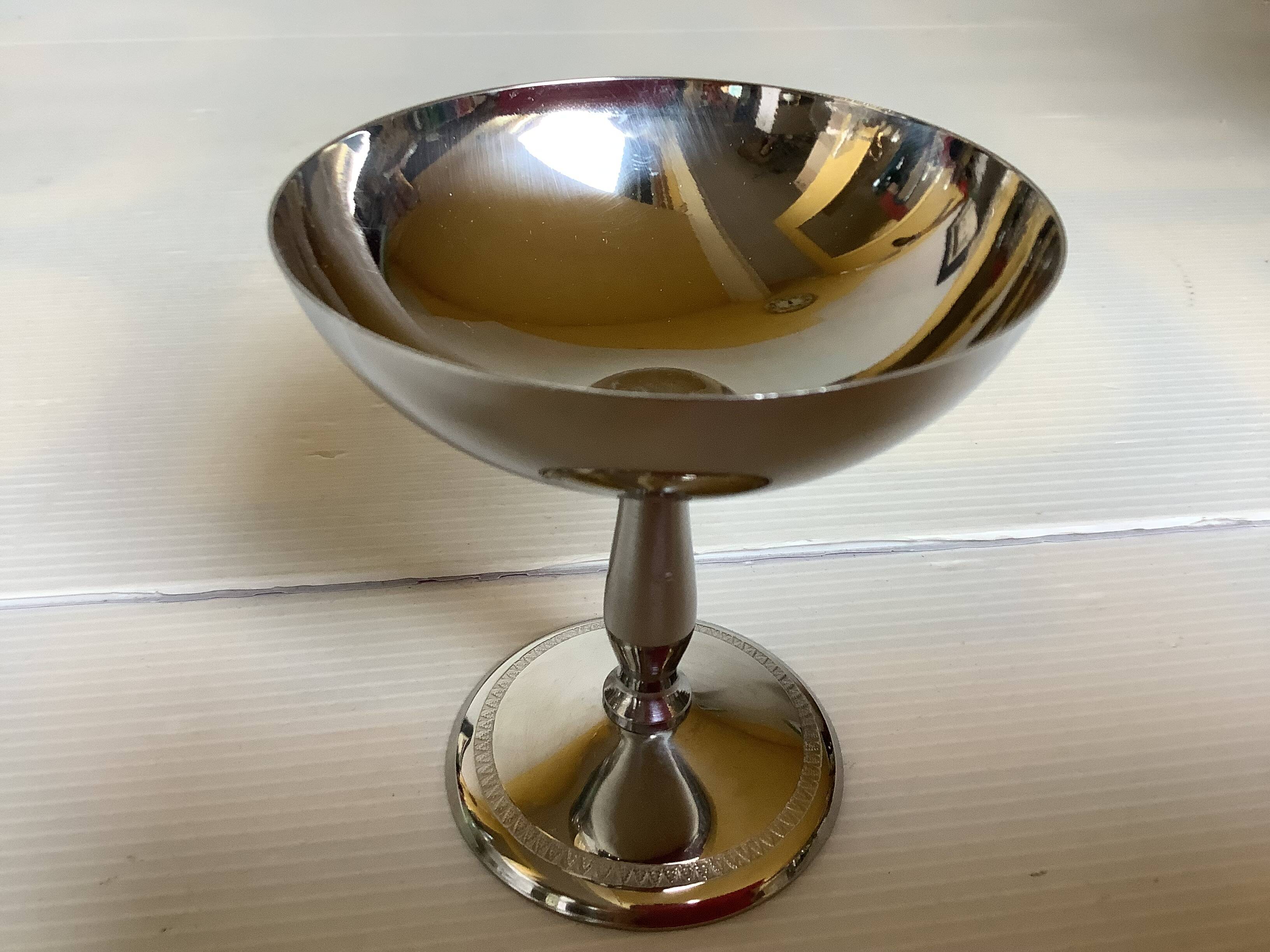 6 footed bowls with silver frieze in metal for ice.