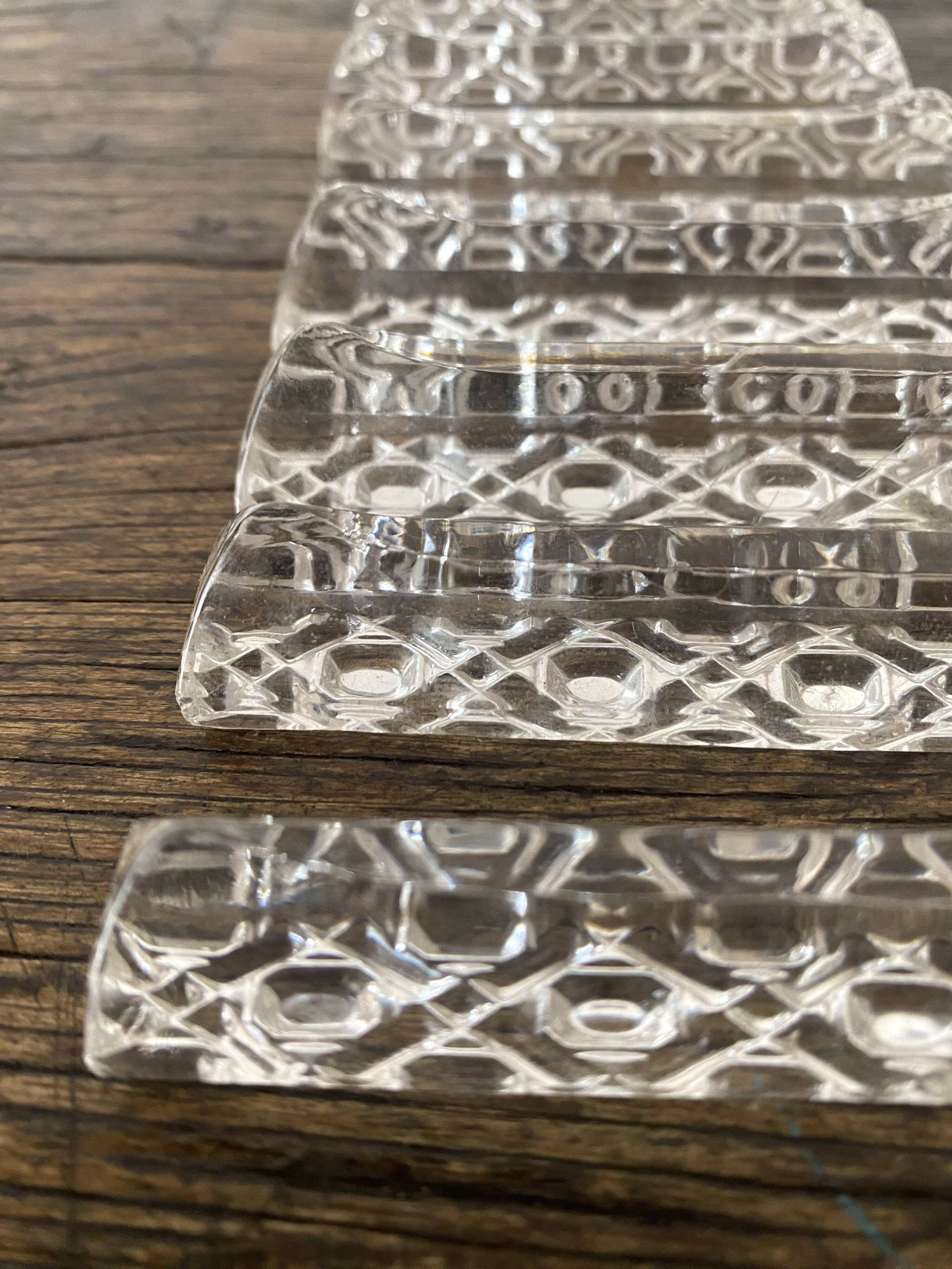 Set of antique glass knife holders