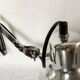 Vintage accordion wall light in chrome metal.