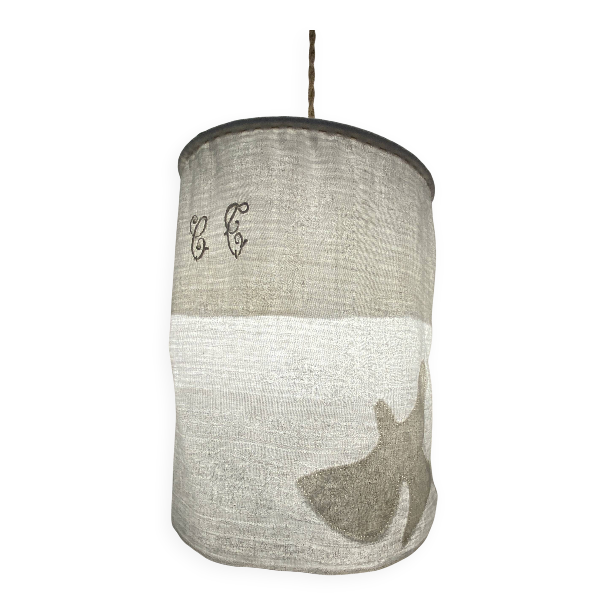 Old linen drapery with monogram and bird by Georges Braque