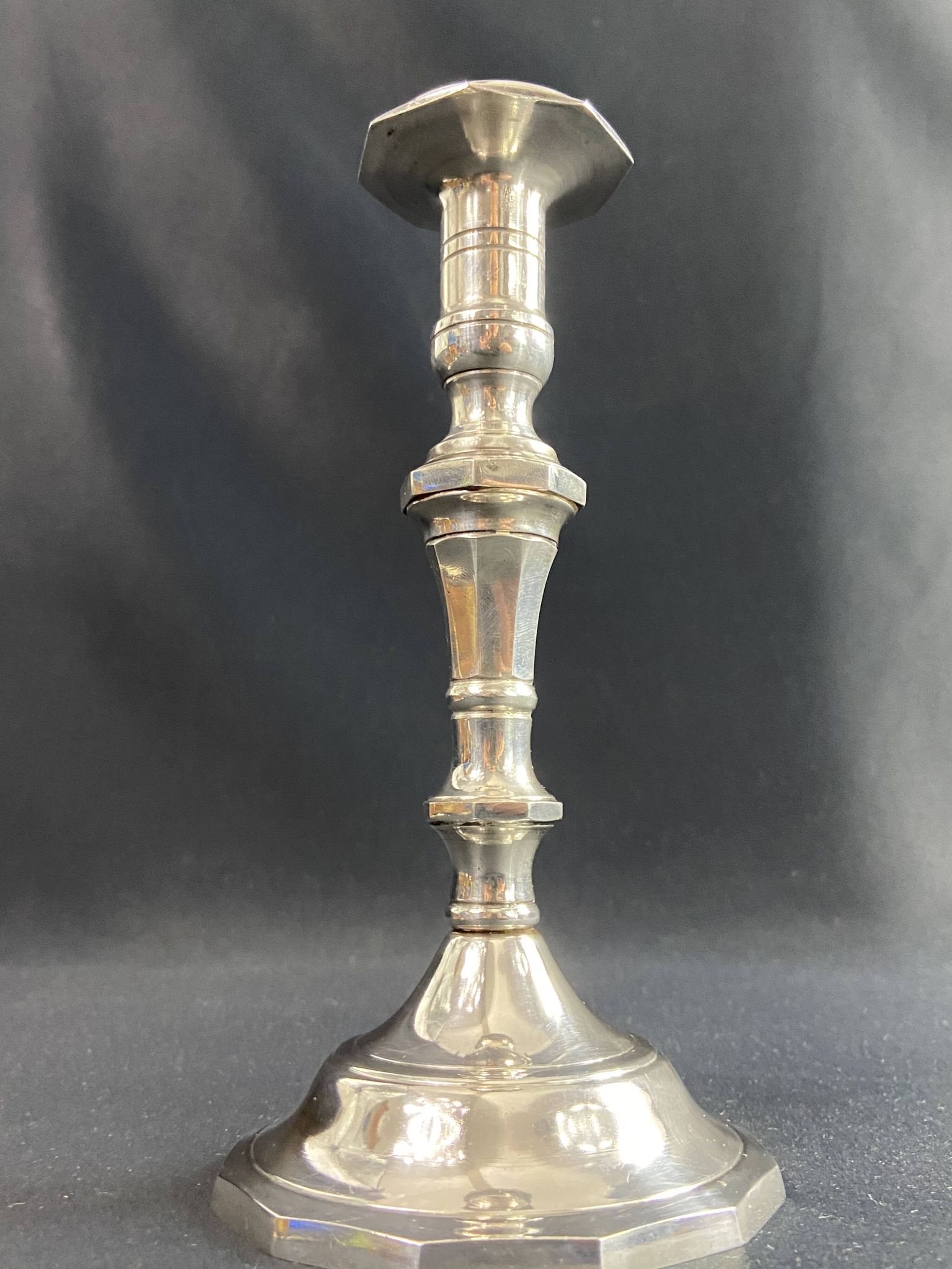 Regency style silver-plated bronze torch candle holder