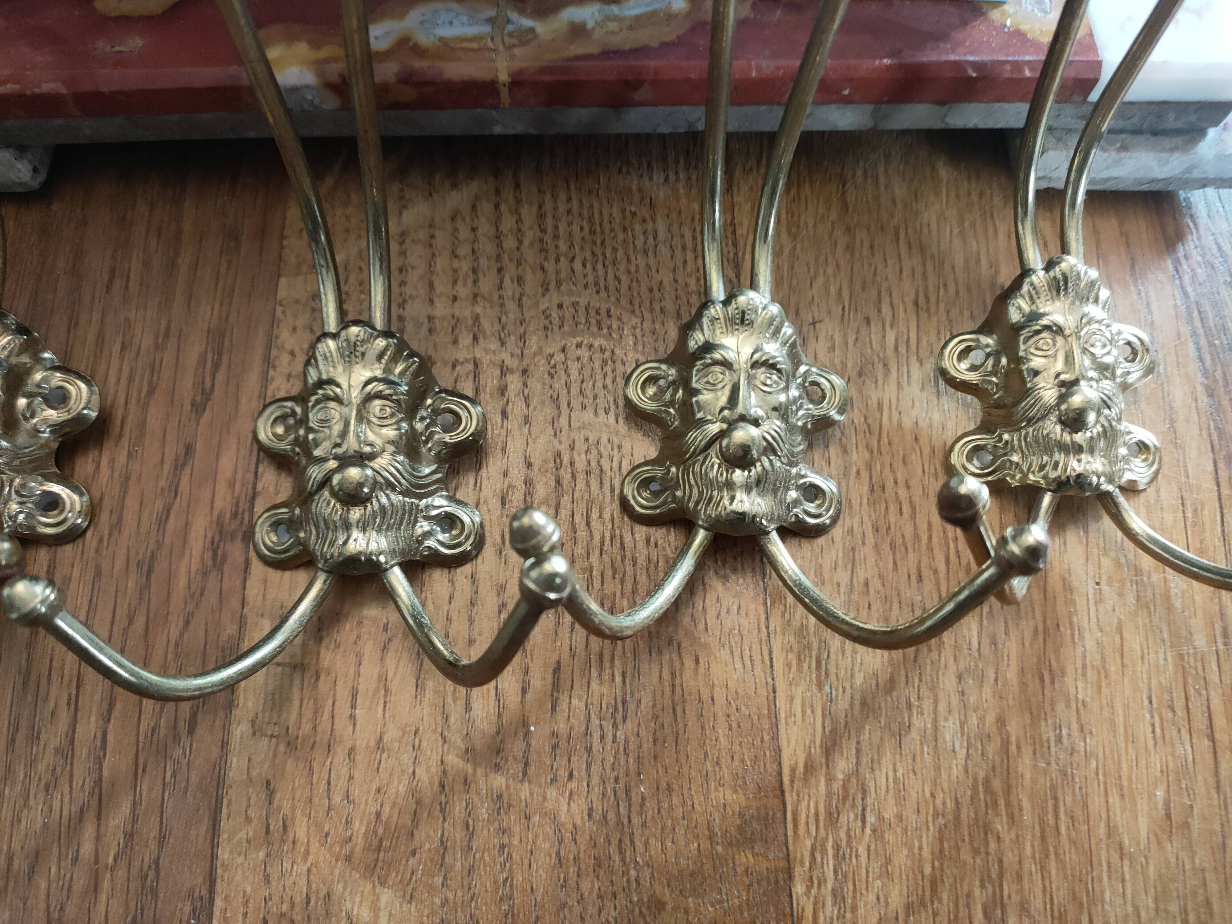 set of 5 antique gold metal hooks