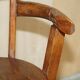 Antique captain's swivel chair on a draft horse wheel from around 1760.