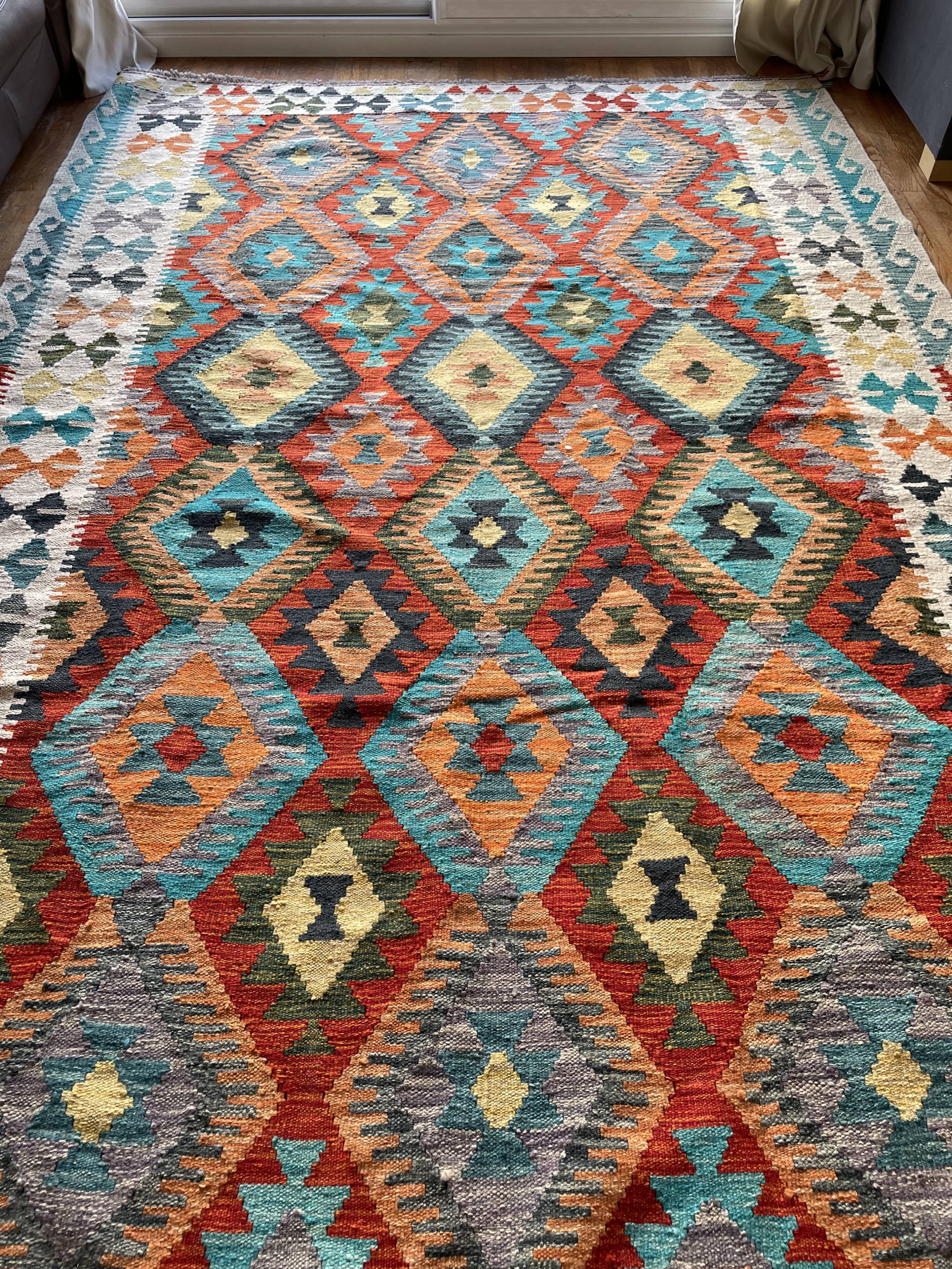 Oriental kilim rug afghan colored red and multicolored