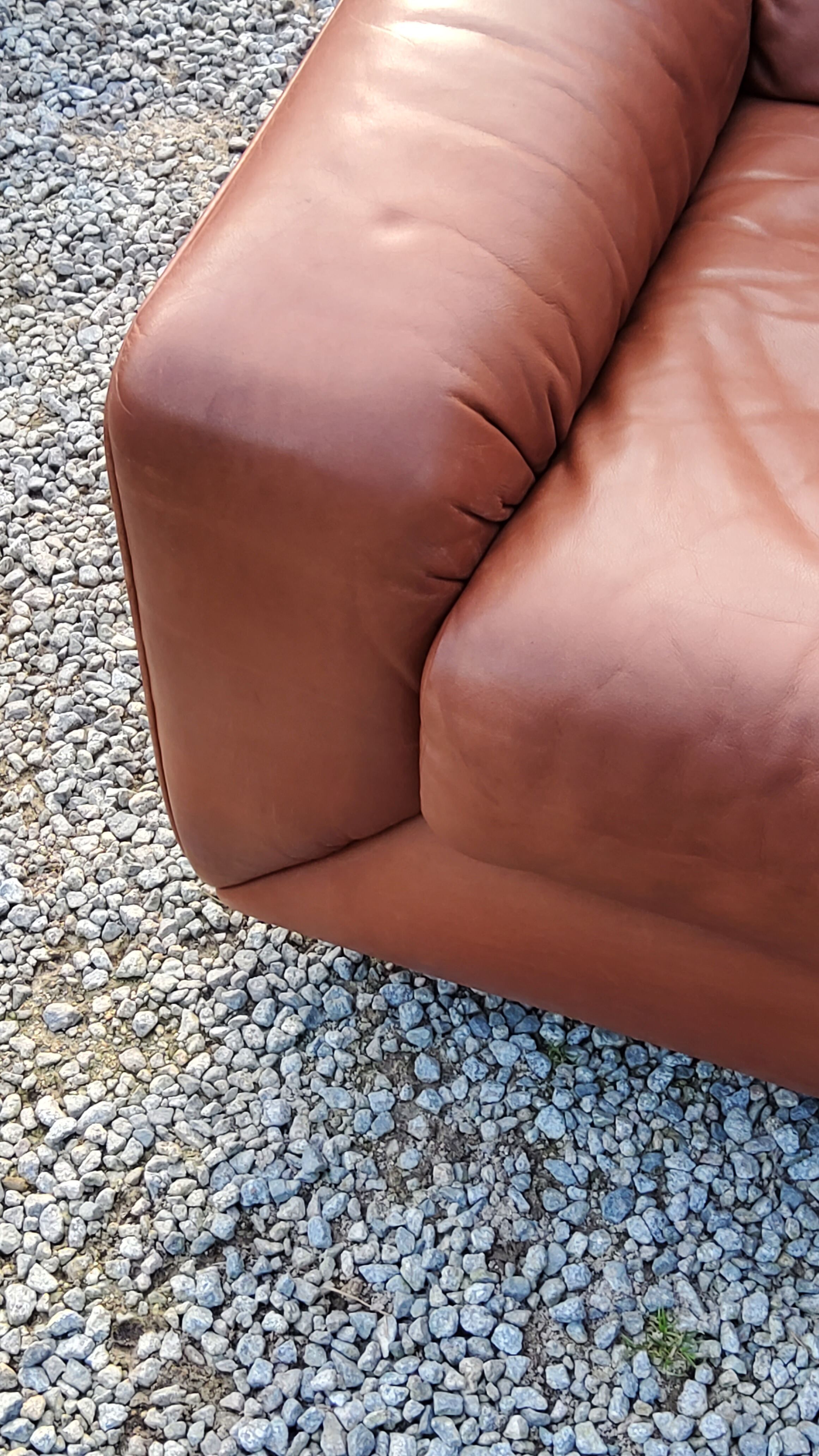 Pair of armchairs and De Sede sofa in cognac leather from the 70s/80s