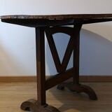Round winemaker's table on original leather inlay gilded