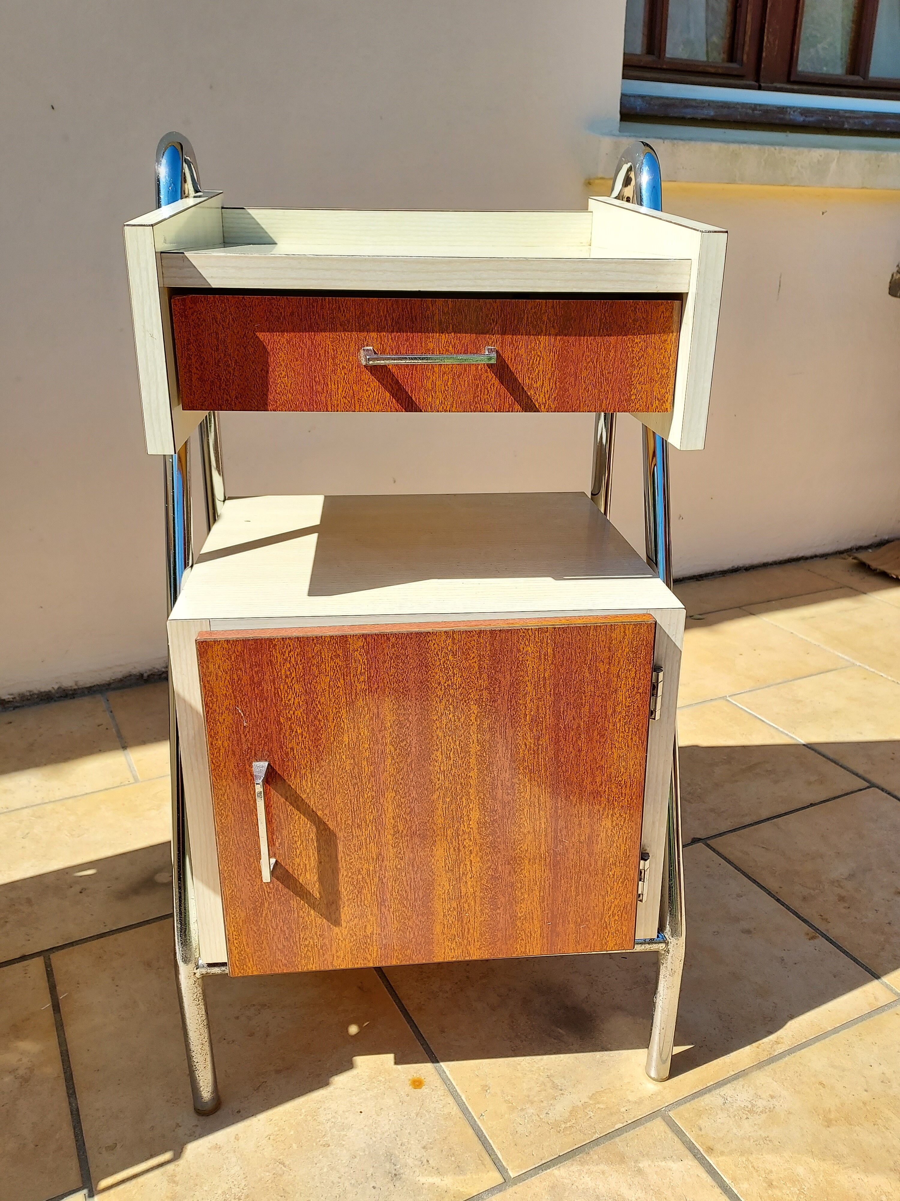 Pair of chrome boarding bedsides