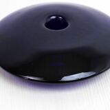 Blue glass saucer candle holder