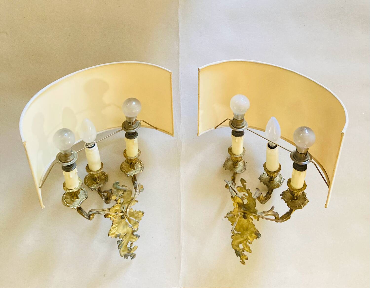 Louis XV gilt bronze wall lights from the 19th century with lampshades
