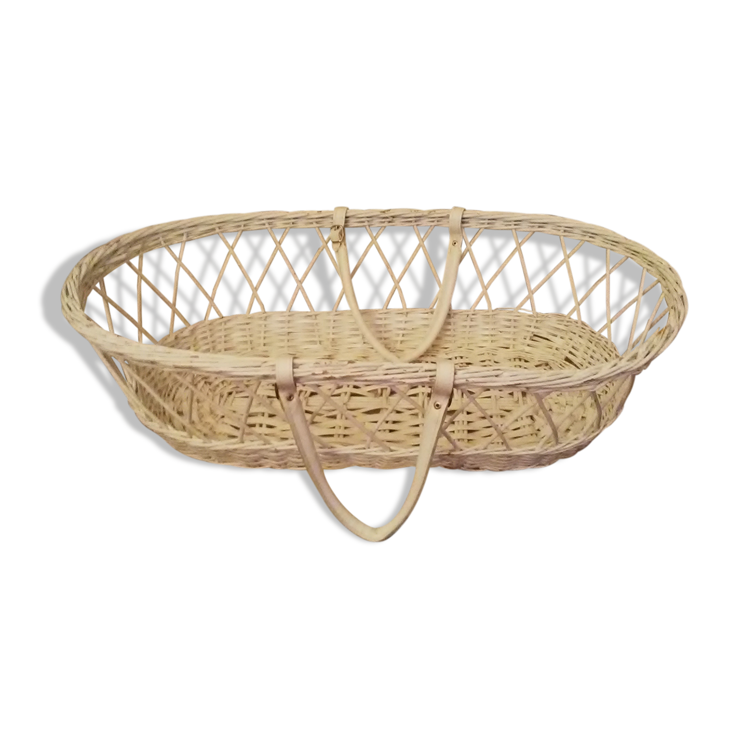 white wicker bassinet