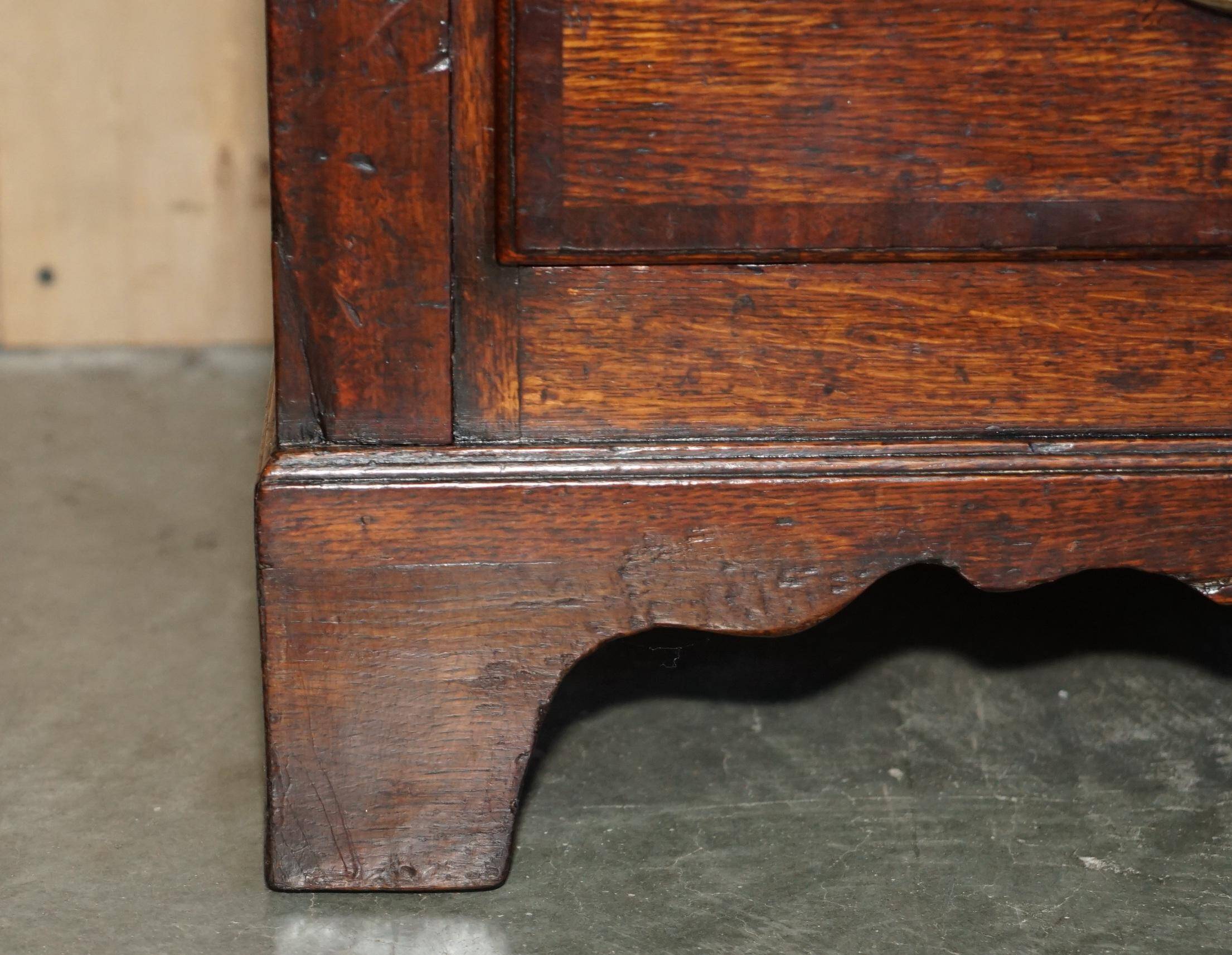 Georgian oak commode with a folding top, English, 18th century.