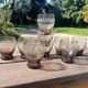 Set of 9 digestive glasses, smoked glass cut in art deco style