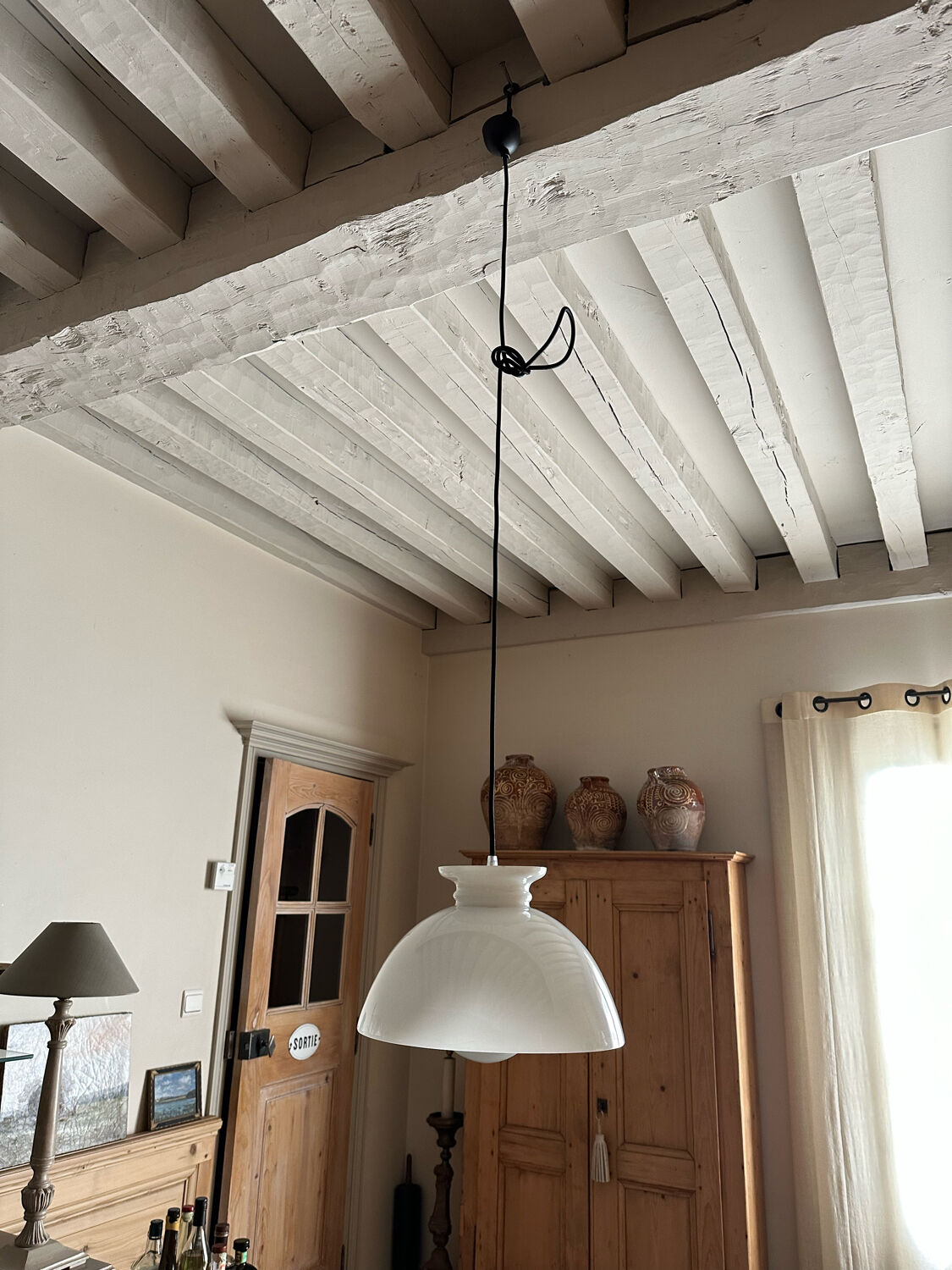 Suspension in opaline