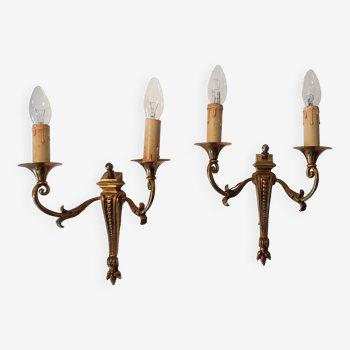Pair of neoclassical sconces in bronze and gilded brass 1950.