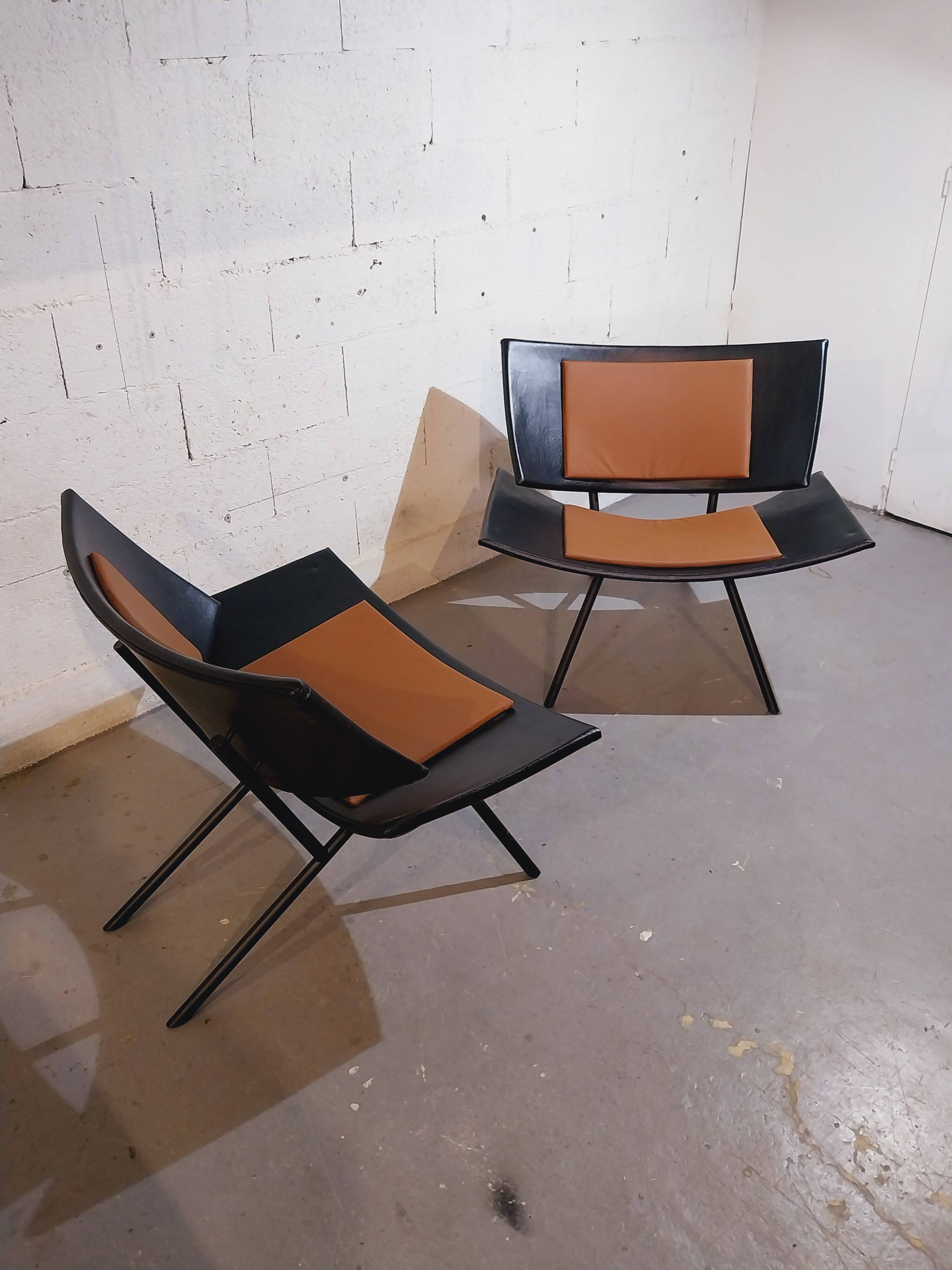 Pair of large airplane wing armchairs 1980