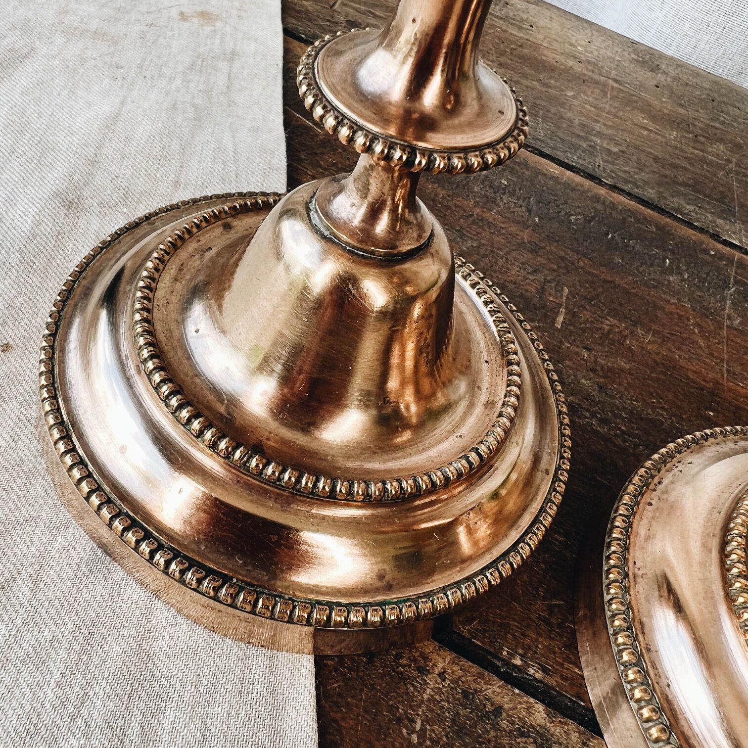 Duo of brass candle holders