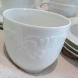 Set of 9 white porcelain coffee cups