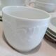 Set of 9 white porcelain coffee cups