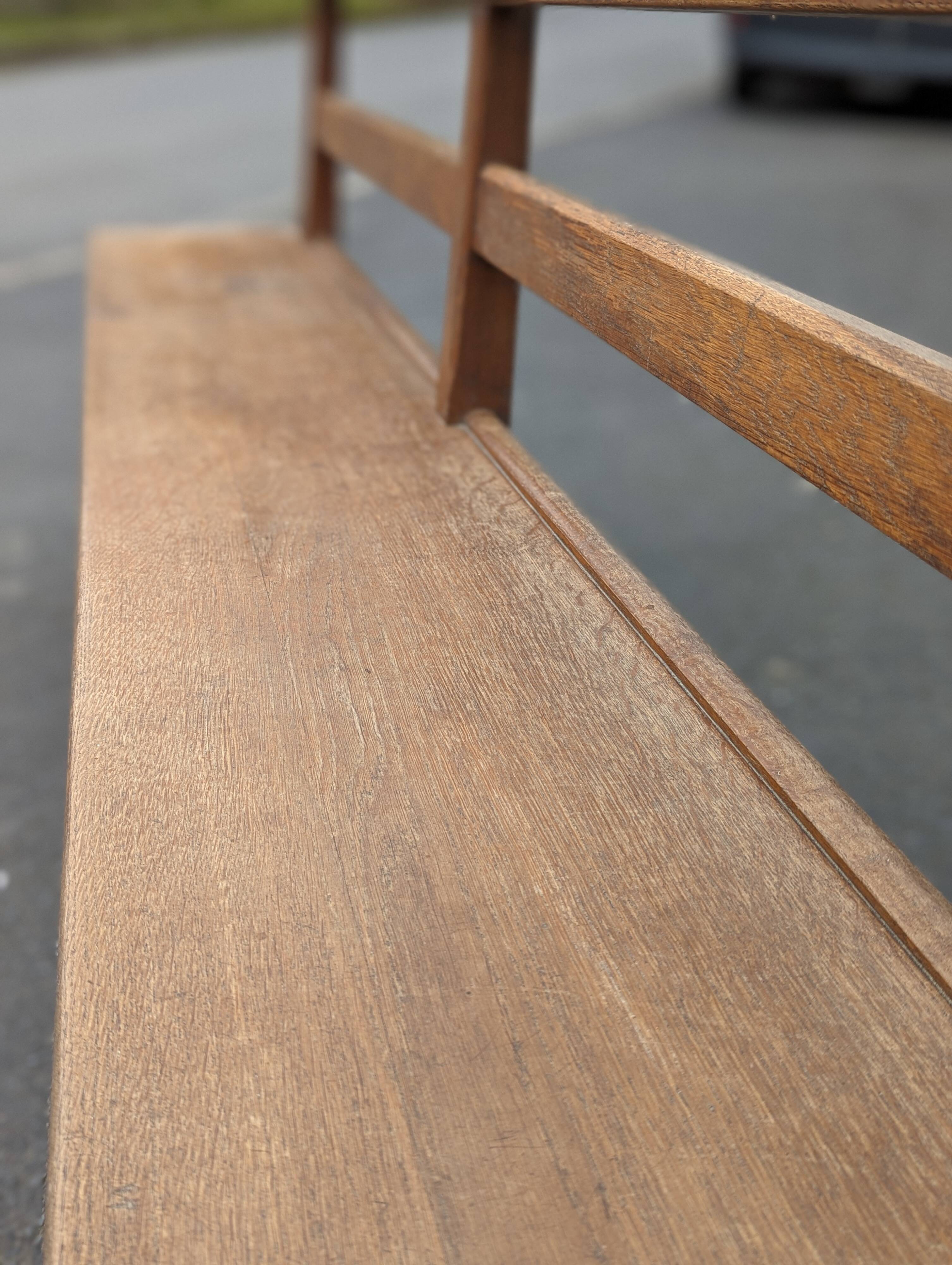 Large oak bench with back