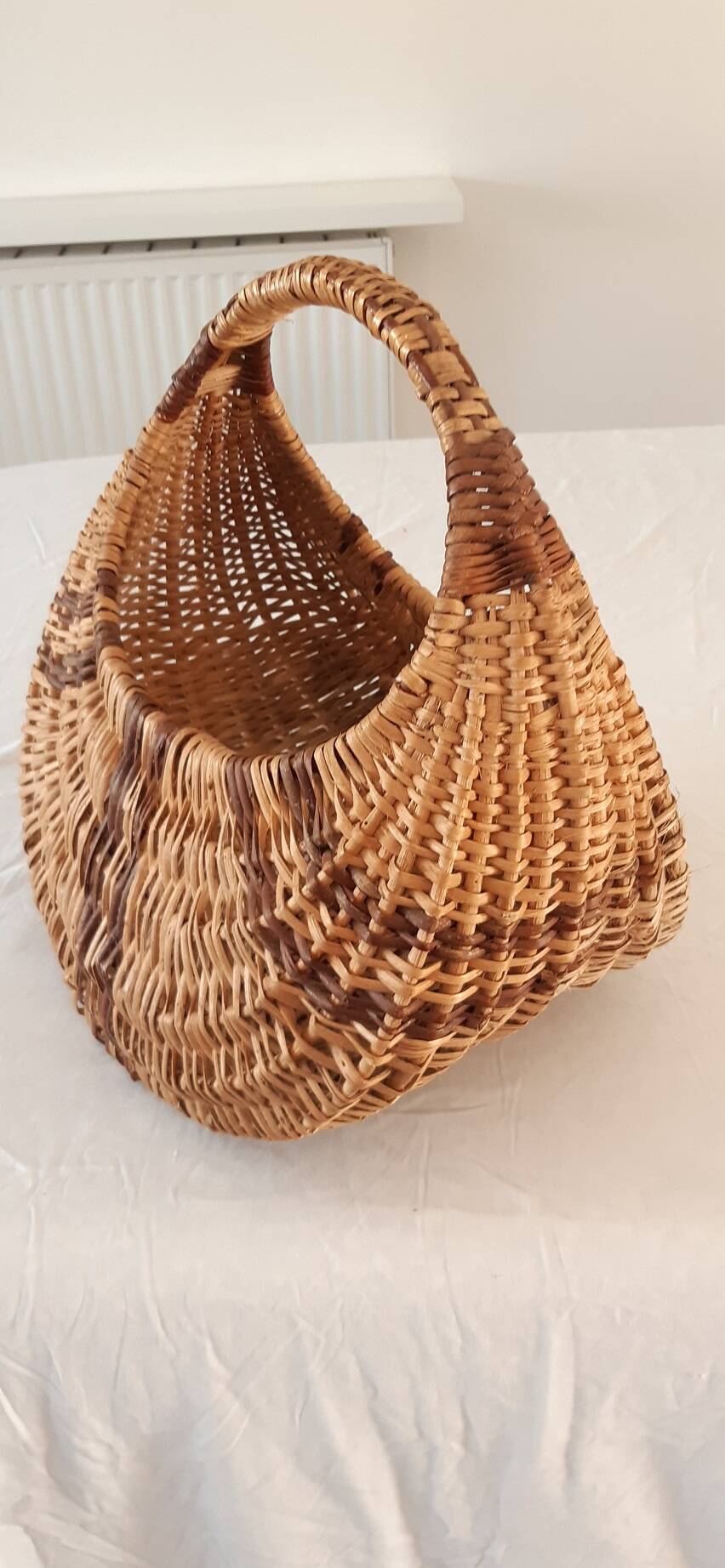 Old banana basket with wicker two colors