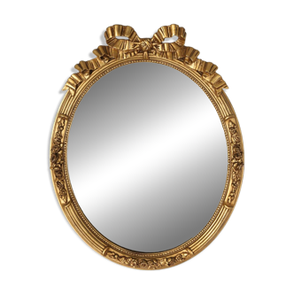 Large antique oval gilt mirror in wood and plaster, Belgium ca. 1900