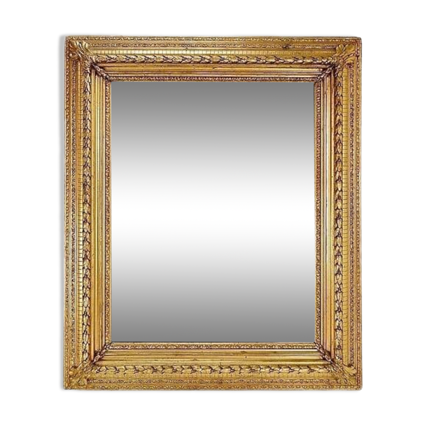 Large gilded wood and stucco mirror with foliage