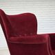 Fauteuil danois des années 1970, velours de mobilier rouge cerise, pieds en bois de chêne.