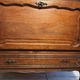 Louis XV style oak TV cabinet with drop-down flap.
