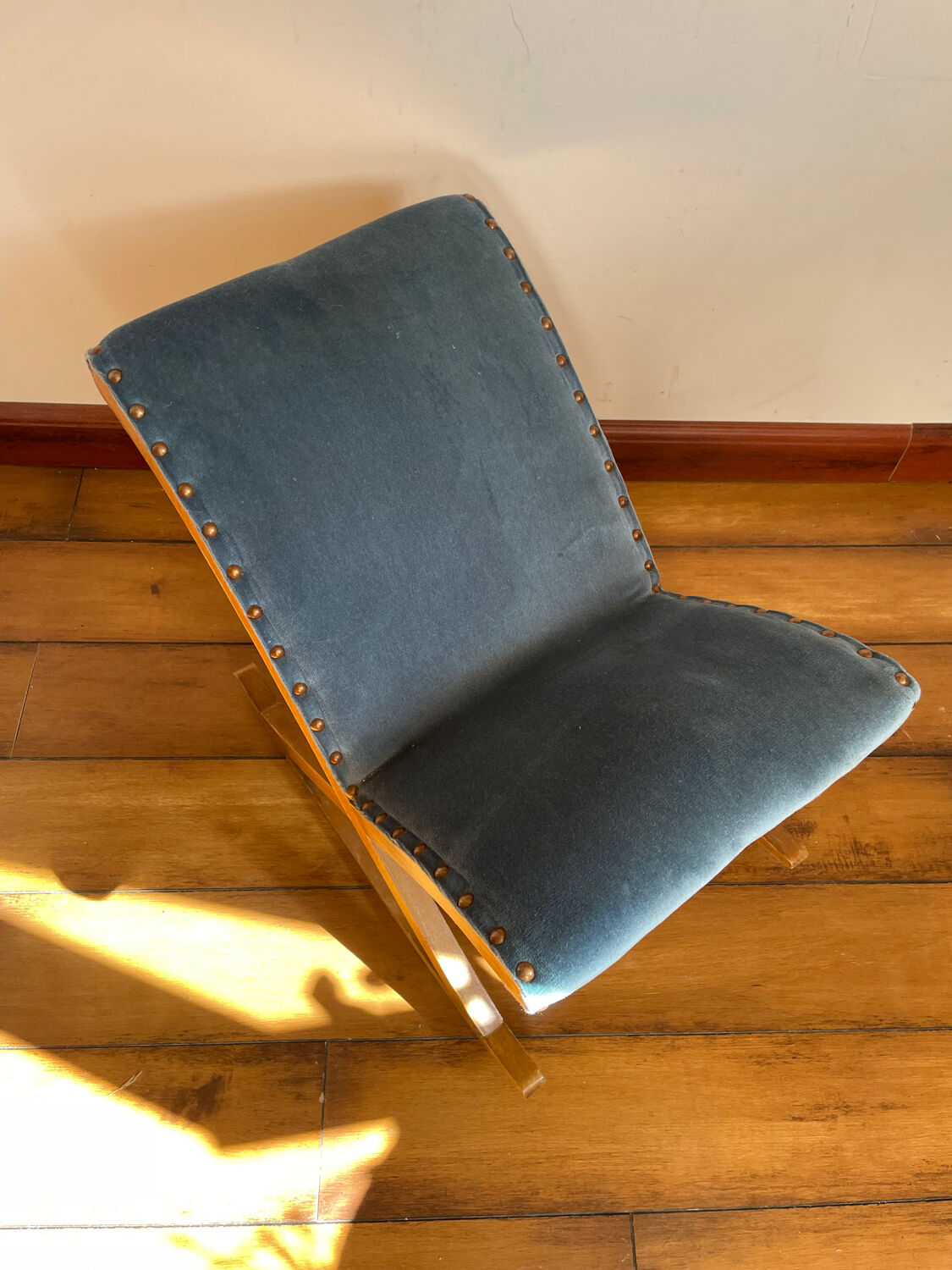 Rocking blue velvet footrest
