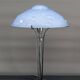 Lampe en fer forgé et abat-jour en verre bleu aux clématites, France, Art Déco, circa 1920