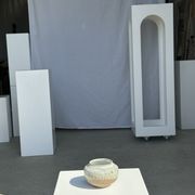 Small white ball vase tight neck in glazed speckled ceramic