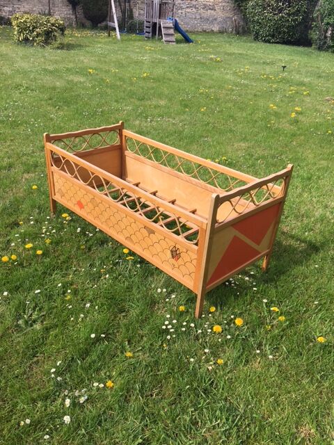 Wood and rattan baby bed