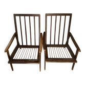 A pair of Scandinavian style armchairs.