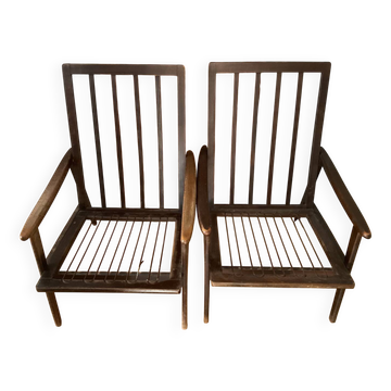 A pair of Scandinavian style armchairs.