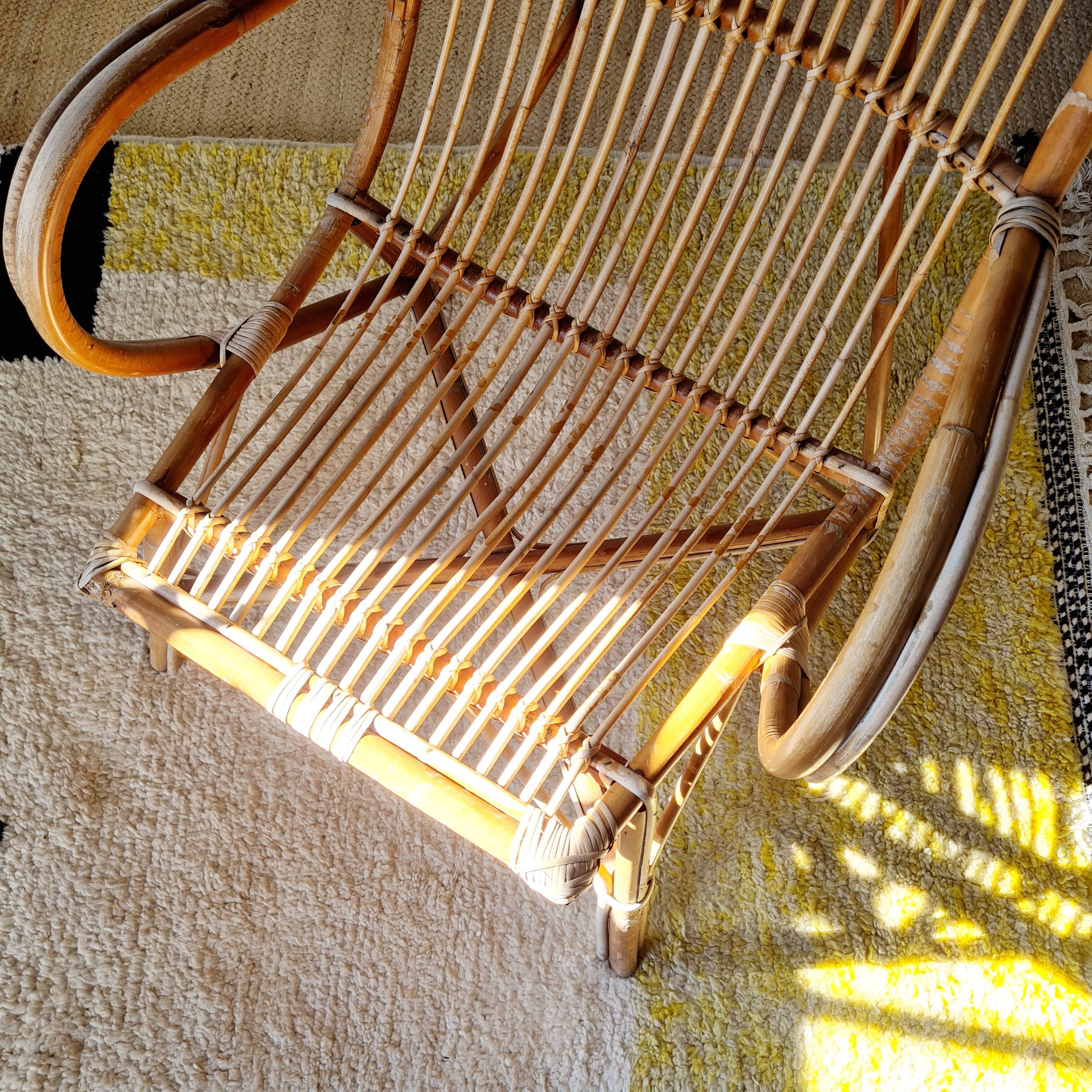Fauteuil ancien en rotin large dossier