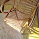 Fauteuil ancien en rotin large dossier
