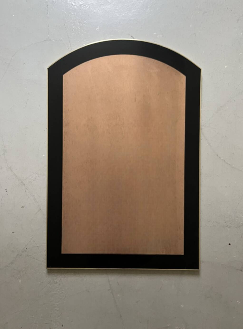 Large brass mirror and pink glass circa 1970