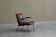 Modernist Dutch lounge chair in enamelled steel and leather from the 1950s.