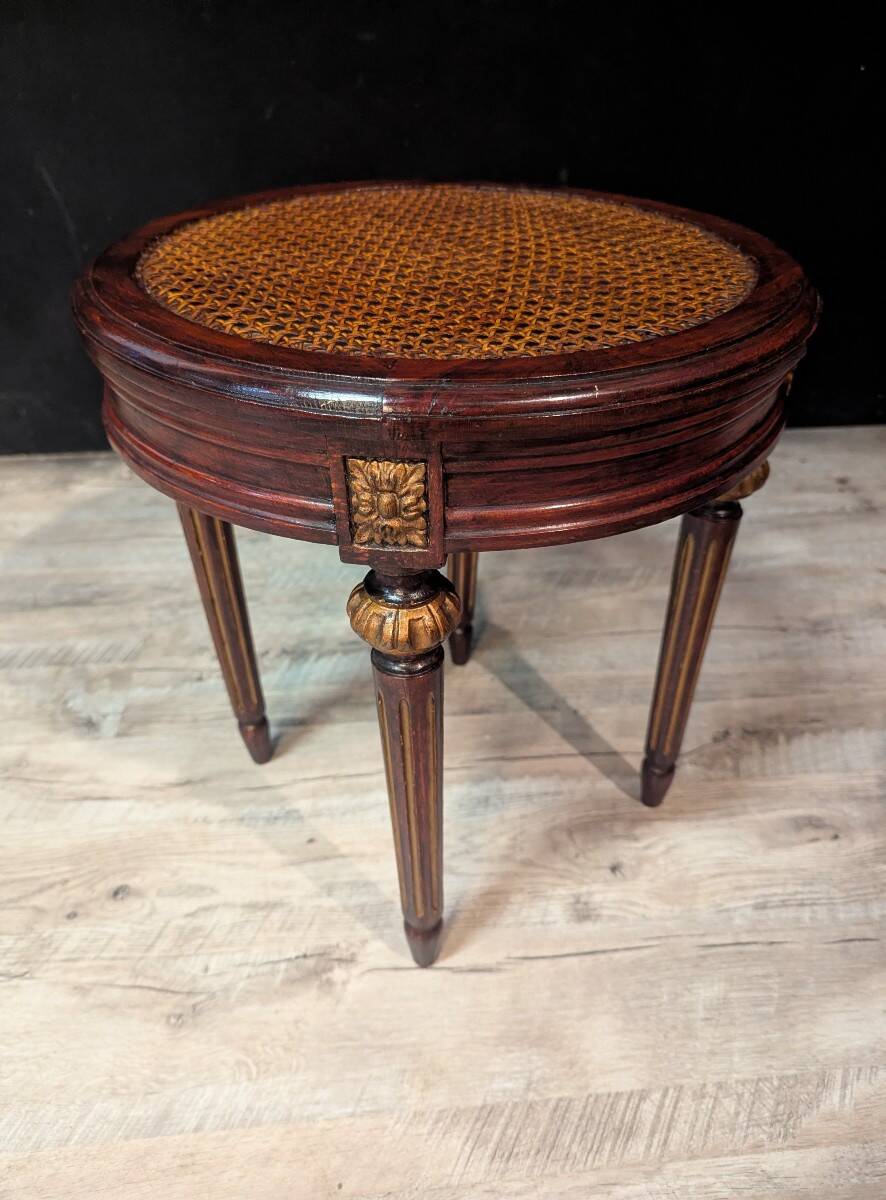 Pair of Louis XVI style stools with caned seats.