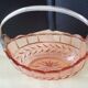 Pink molded pressed glass fruit basket centerpiece