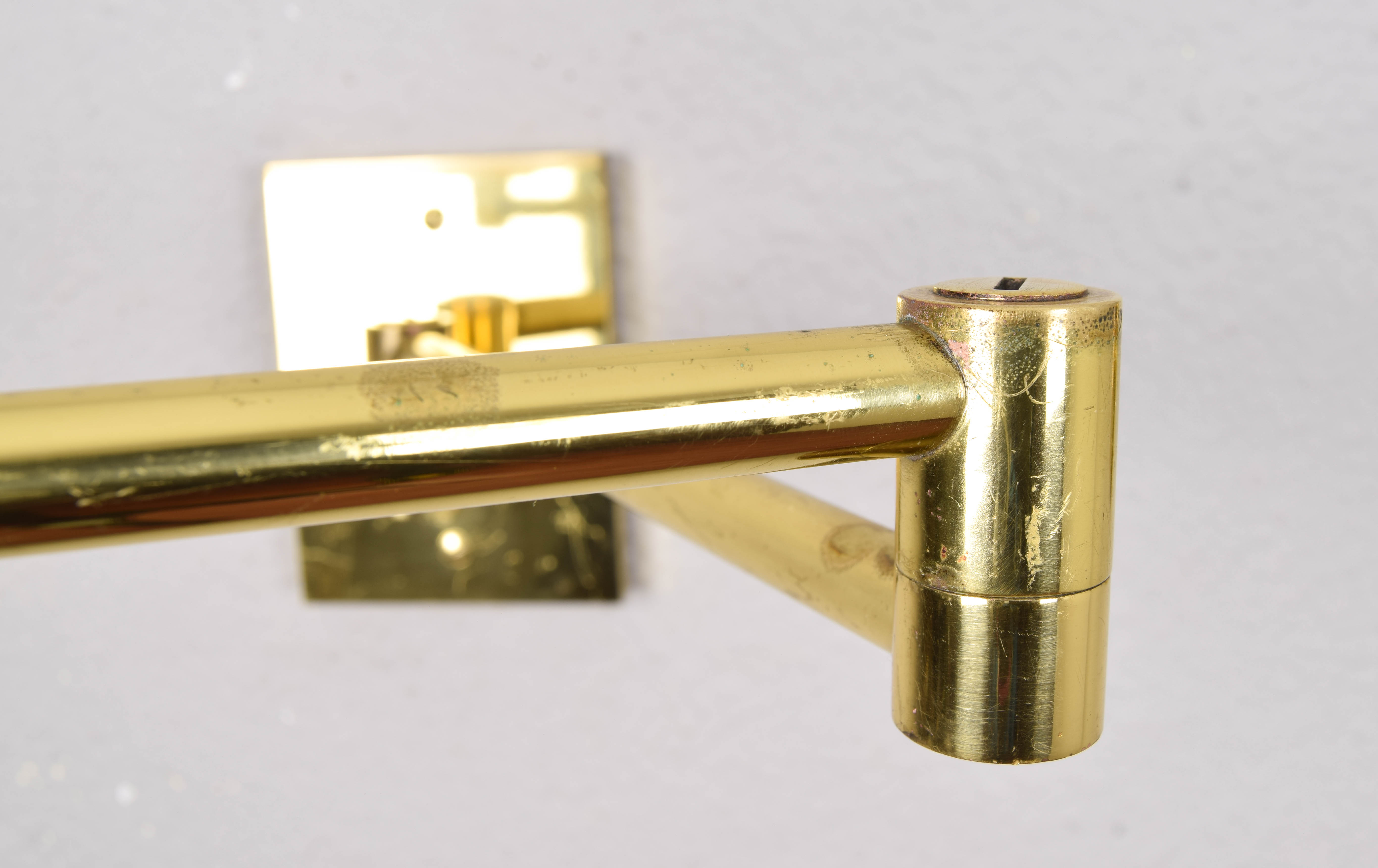 Two Mid-Century Modern Swing Arm Brass Sconces by George W Hansen for Metalarte
