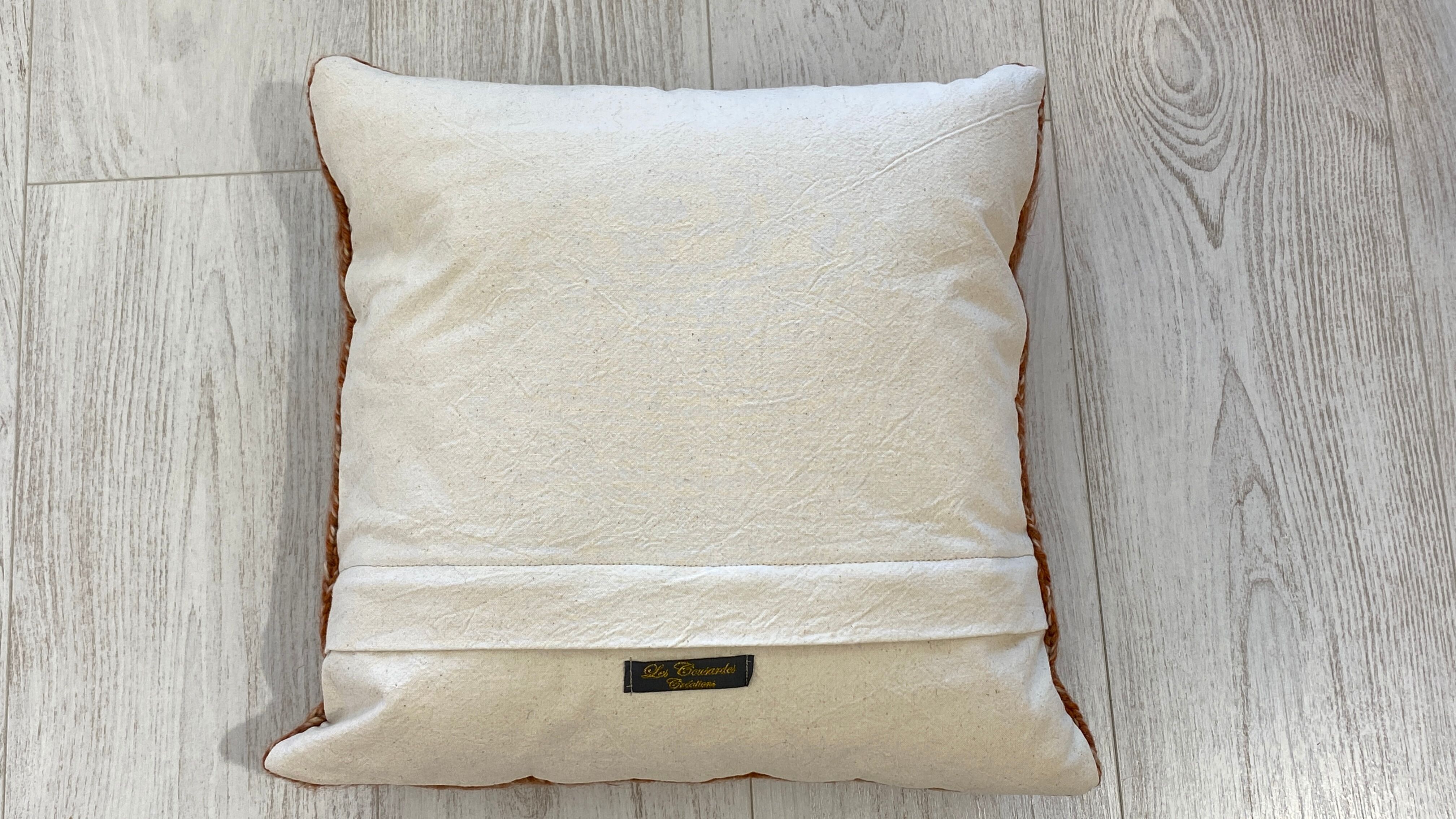 Pair of retro terracotta wool knit cushions