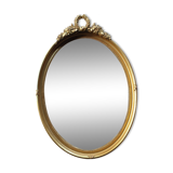 Golden oval mirror 34x50cm