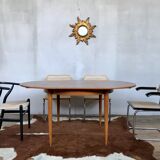Large Scandinavian round table with 2 extensions, entirely made of teak