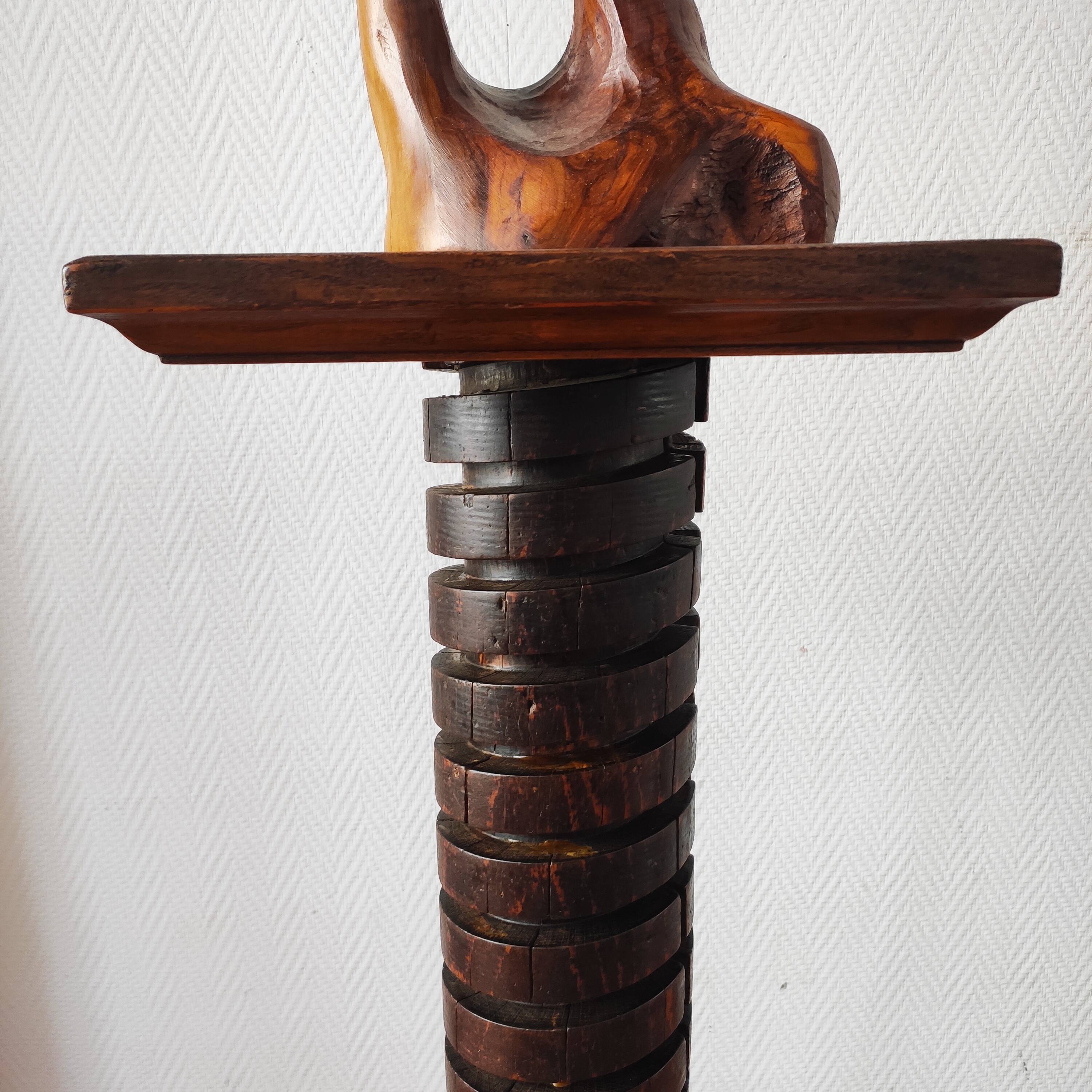 Brutalist column – old Burgundy press screw