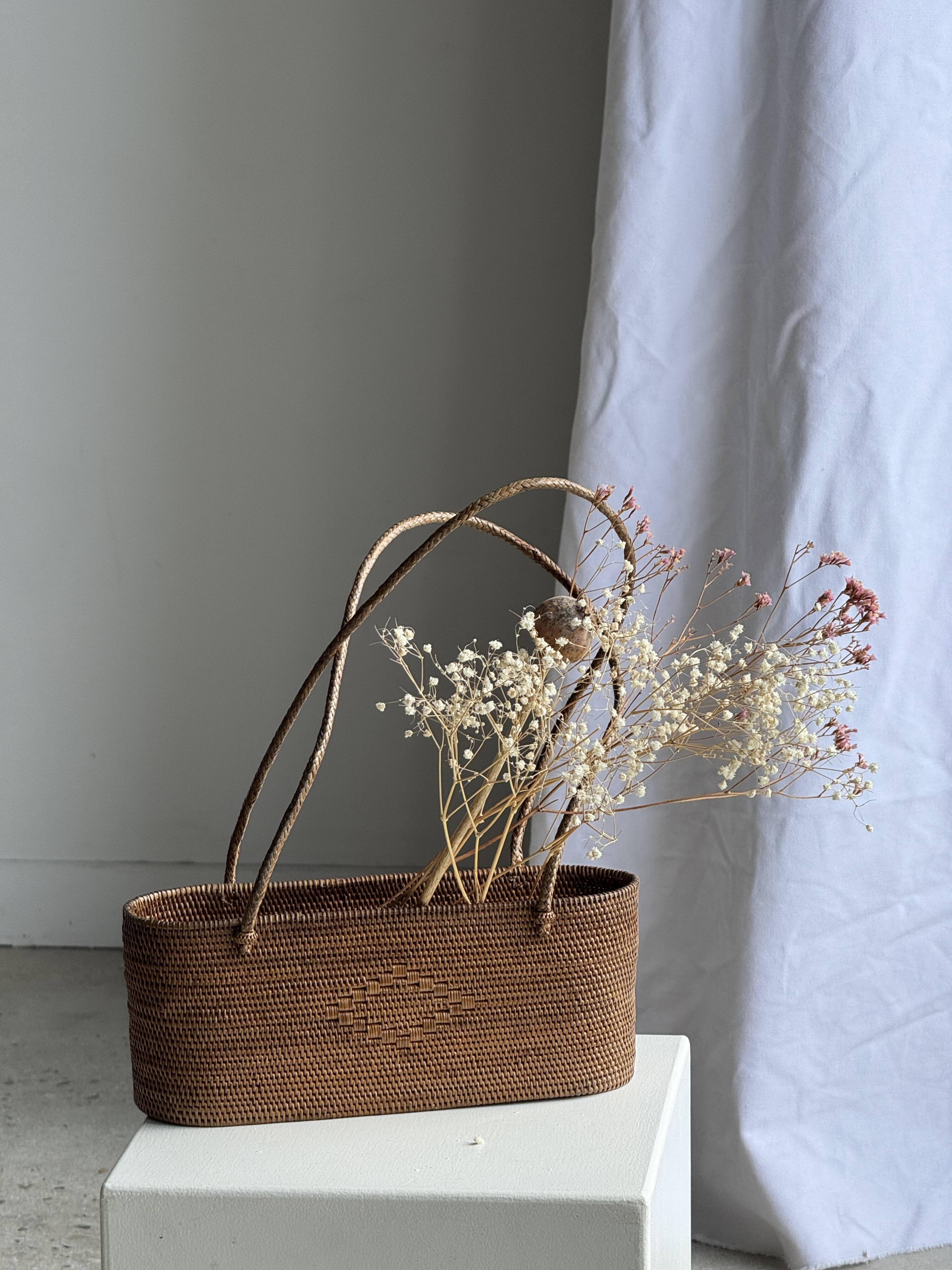 Small oval basket with long handles, traditional Indonesian L28xH10