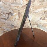 Old beveled Venetian mirror with engraved flower decoration